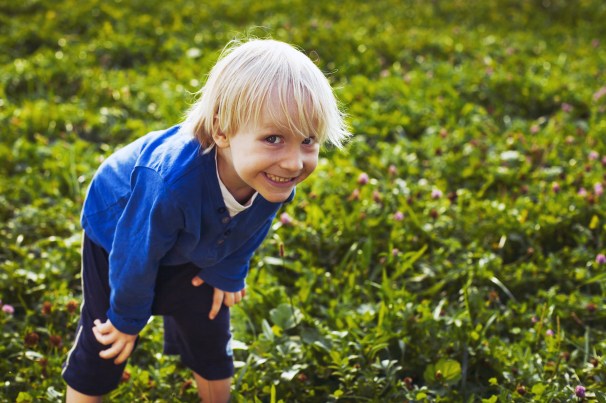 cute crafty little boy outdoors portrait of smiling child.jpg